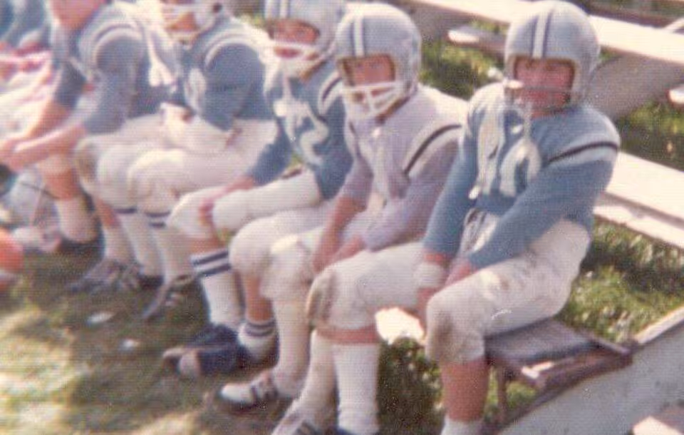 Color family photo of A photograph of players on a team in the Lincoln Village Middle School football league.
