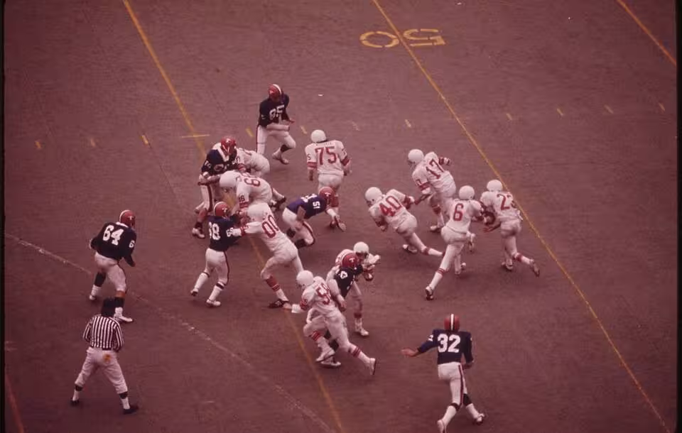Vintage color photo of TO CONSERVE ENERGY ALL PORTLAND HIGH SCHOOLS HAD THEIR FOOTBALL GAMES RESCHEDULED FOR DAYLIGHT HOURS AT THE MULTNOMAH, courtesy of David Falconer.