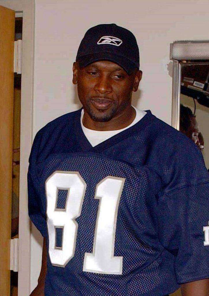 Full color photo of Tampa Bay Buccaneers wide receiver Tim Brown Photographer's Mate 1st Class Aviation Warfare Systems Operator Toiete Jackson