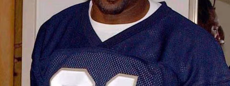 Full color photo of Tampa Bay Buccaneers wide receiver Tim Brown Photographer's Mate 1st Class Aviation Warfare Systems Operator Toiete Jackson
