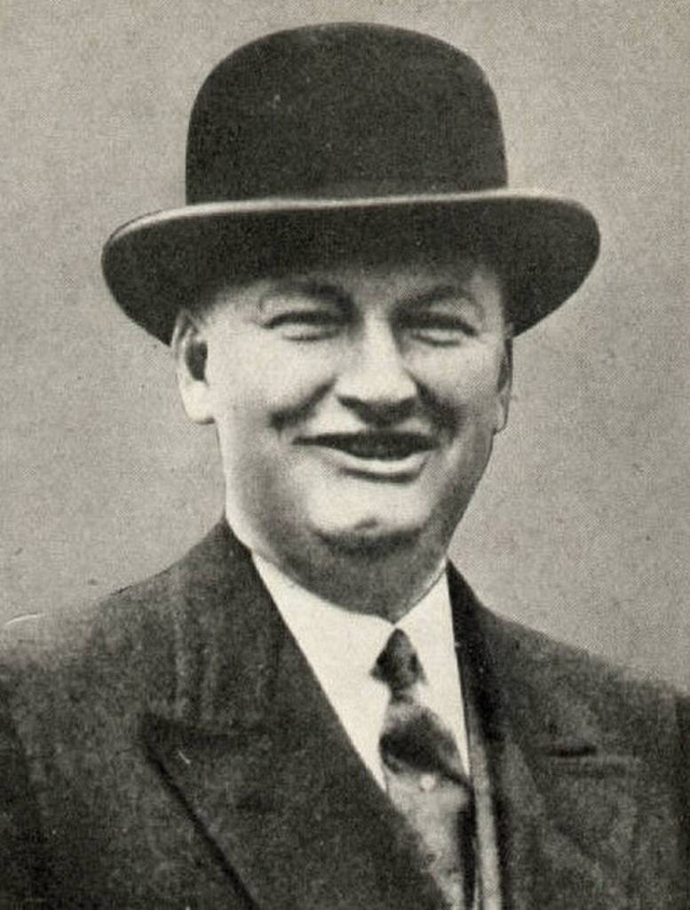 Vintage black and white phooto of image of Tim Mara circa 1930 in a bowler hat(Cropped), courtesy digital enhancement by Mike Moran