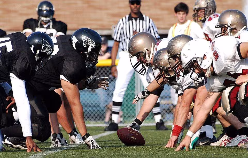 Color photo down the line of scimmage of US Navy 090608-N-3283P-018 The Yokosuka Seahawks face off against the Yokohama Harbors during the U.S. Forces Japan-American Football league at Yokosuka Field.jpg