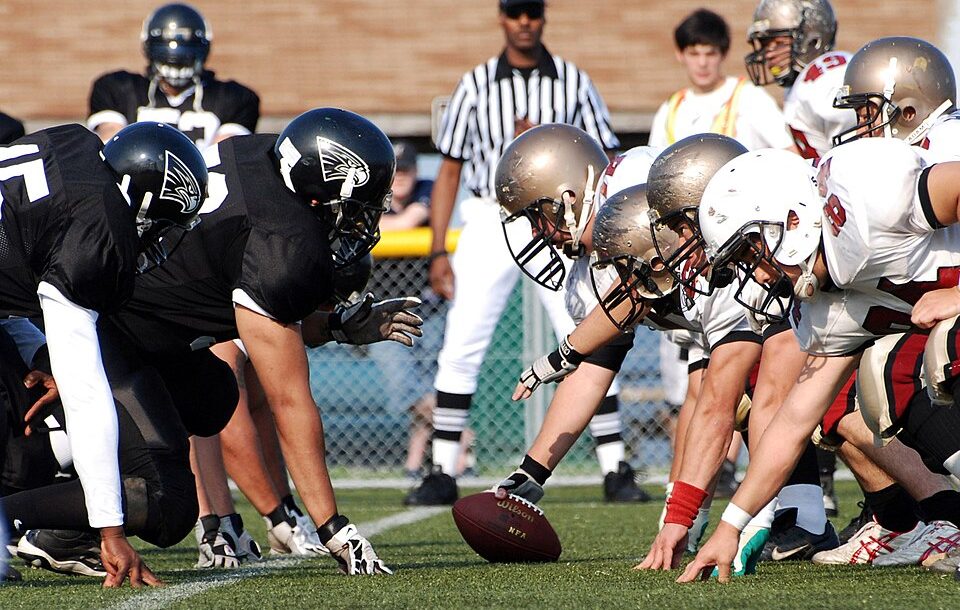 Color photo down the line of scimmage of US Navy 090608-N-3283P-018 The Yokosuka Seahawks face off against the Yokohama Harbors during the U.S. Forces Japan-American Football league at Yokosuka Field.jpg