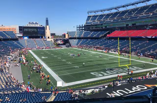 Full color inside stadium view photo of Gillette Stadium before the Jets-Patriots game 2019-2020, courtesy of Photo by Natan Macoul on Unsplash