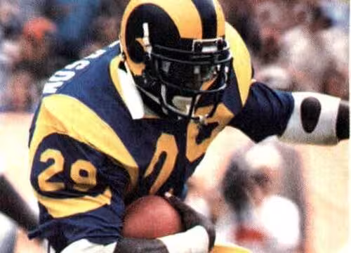KIIS Radio/Los Angeles Rams/Los Angeles County Sheriff's Department - "1985 Police Raiders/Rams- #20 Eric Dickerson". KIIS Radio/Los Angeles Rams/Los Angeles County Sheriff's Department. 1985. Los Angeles Rams running back Eric Dickerson rushing the ball against the Cleveland Browns during a September 9, 1984 home game at Anaheim Stadium.