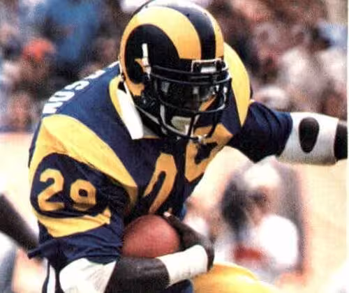 KIIS Radio/Los Angeles Rams/Los Angeles County Sheriff's Department - "1985 Police Raiders/Rams- #20 Eric Dickerson". KIIS Radio/Los Angeles Rams/Los Angeles County Sheriff's Department. 1985. Los Angeles Rams running back Eric Dickerson rushing the ball against the Cleveland Browns during a September 9, 1984 home game at Anaheim Stadium.