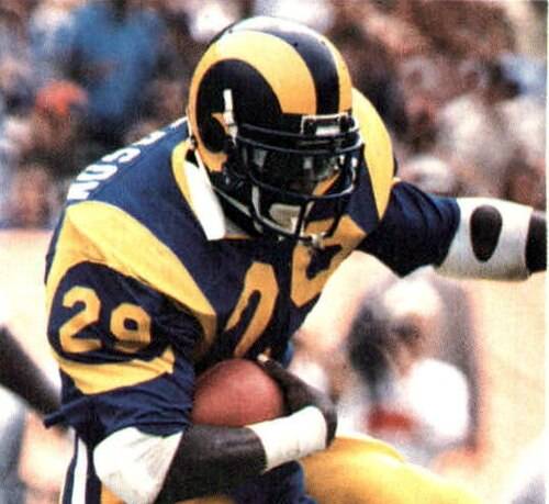 KIIS Radio/Los Angeles Rams/Los Angeles County Sheriff's Department - "1985 Police Raiders/Rams- #20 Eric Dickerson". KIIS Radio/Los Angeles Rams/Los Angeles County Sheriff's Department. 1985. Los Angeles Rams running back Eric Dickerson rushing the ball against the Cleveland Browns during a September 9, 1984 home game at Anaheim Stadium.