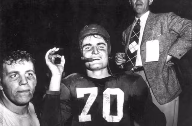 Close up view of football players and coaches: Miami, Florida Date: January 2, 1950 Physical descrip: 1 photoprint - b&w - 4 x 5 in. Series Title: Department of Commerce collection
