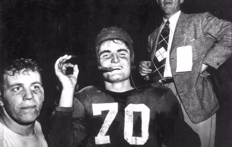 Close up view of football players and coaches: Miami, Florida Date: January 2, 1950 Physical descrip: 1 photoprint - b&w - 4 x 5 in. Series Title: Department of Commerce collection