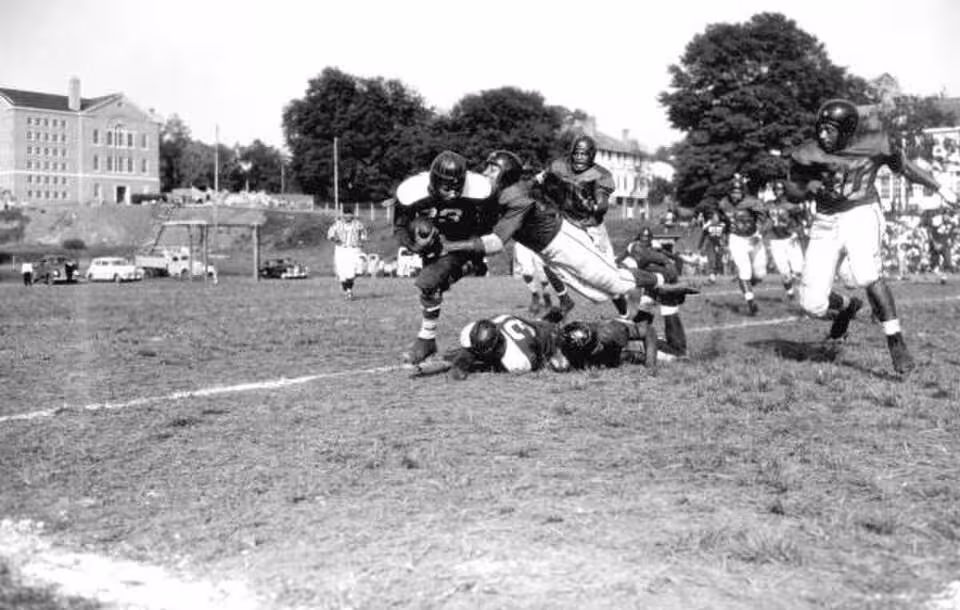 Black and white game action photo of Florida A&M vs. Morris Brown football game: Tallahassee, Florida Date: October 18, 1947