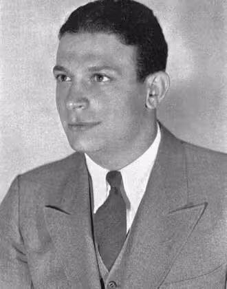 Vintage black and white publicity portrait of Frank Carideo.