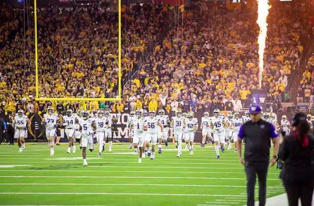 The Joint Armed Forces Color Guard, along with Soldiers from the United States Army Band, present the colors before the 2024 College Football Playoff National Championship Game between the University of Michigan Wolverines and the University of Washington Huskies on January 7-8, 2024 at NRG Stadium in Houston, TX. (U.S. Army photo by Sgt. Ethan Scofield)