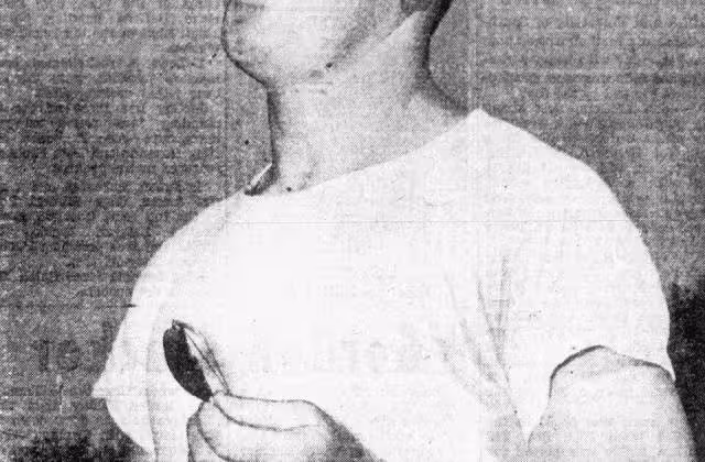 Candid newspaper publicity photo of American football coach Johnny Baker