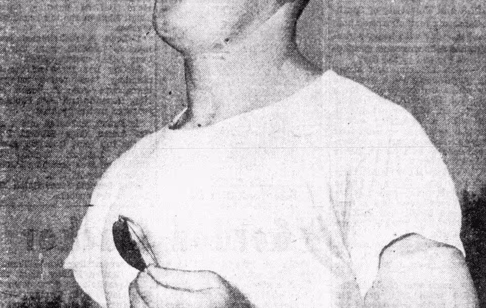 Candid newspaper publicity photo of American football coach Johnny Baker