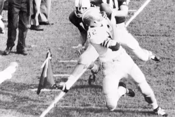 Lane Fenner catching a pass in the end zone during the University of Florida - Florida State University football game: Tallahassee, Florida Date: October 8, 1966