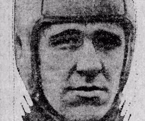 Vintage newspaper grainy black and white cropped head shot of Iowa Team captain Gordon Locke in 1922.