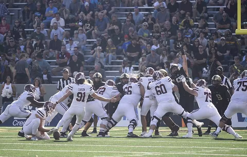 Full color game action photo of The U.S. Military Academy Army Football team, representing the 7th Infantry Division, takes on the University of Massachusetts Minutemen at Michie Stadium, West Point, N.Y., October 28, 2023. (U.S. Army Photo by John Pellino/USMA)