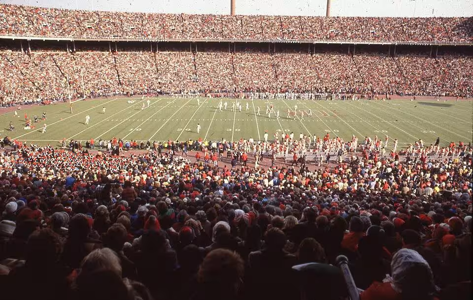 Color instadium view of A view inside a crowded Ohio Stadium during a football game between the Ohio State University Buckeyes and the Michigan State University Spartans.