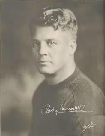 Walker's Cleaners and Tailors, Green Bay, Wisconsin. Photographer unknown. - https://www.tcdb.com/ViewSet.cfm/sid/107092/1932-Walker's-Cleaners-Green-Bay-Packers A football card portrait of Rudy Comstock from the 1932 Walker's Cleaners Green Bay Packers set.