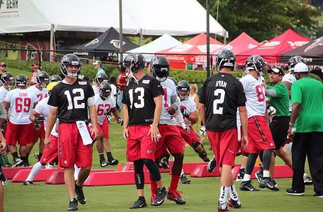Color photo of Atlanta Falcons 2015 training camp, with (#12), TJ Yates (#13) and Matt Ryan (#2).