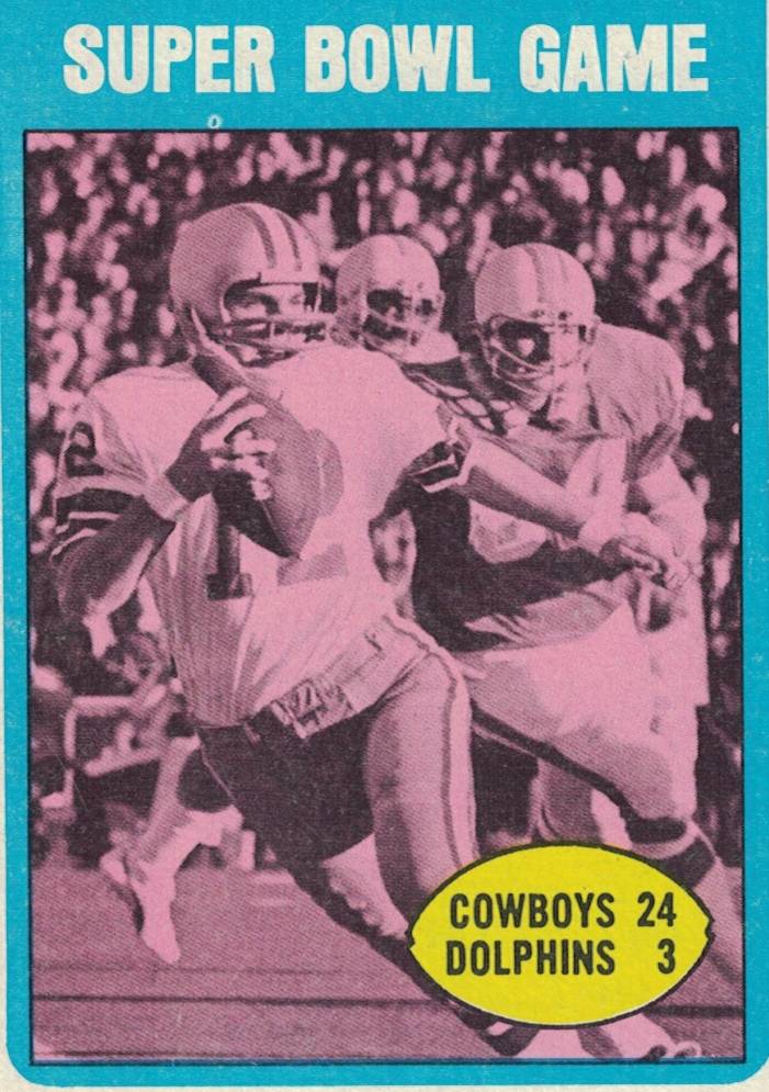 Semi-Colored, Dallas QB Roger Staubach avoids pressure during a scramble to help the Cowboys defeat the Dolphins in Super Bowl VI on this T.C.G. 1972 trading card #139. Darin Hayes' personal Collection.