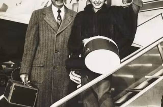 Wellington and Ann Mara in 1954 boarding a plane.