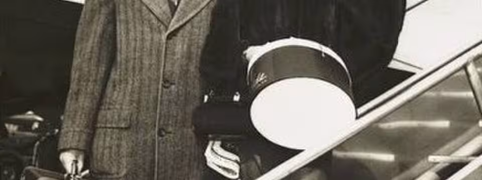 Wellington and Ann Mara in 1954 boarding a plane.