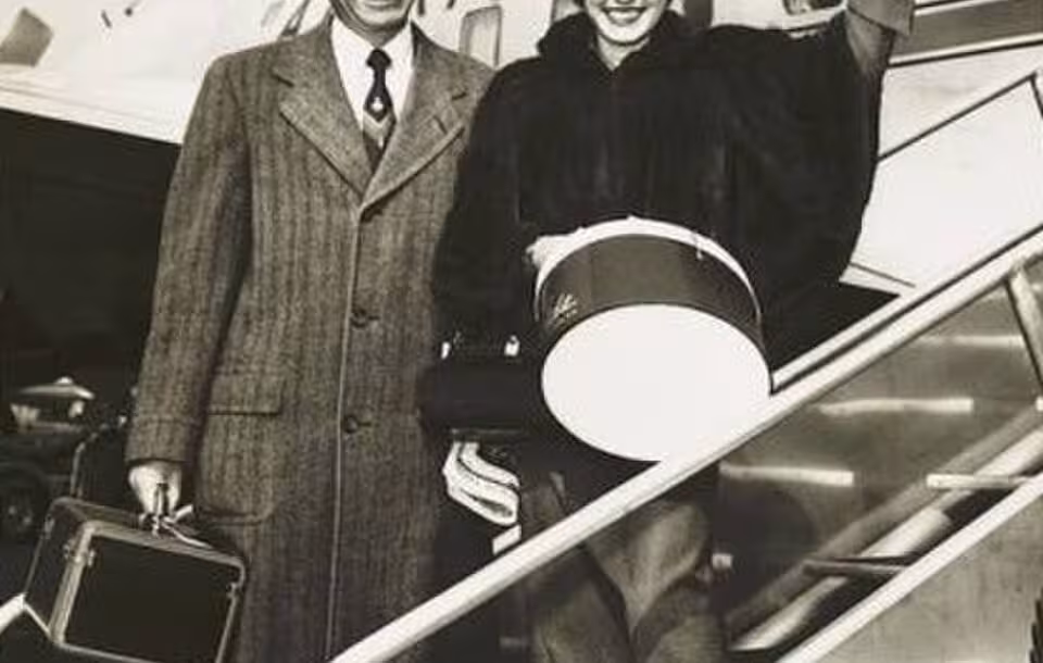 Wellington and Ann Mara in 1954 boarding a plane.