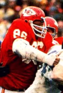 Buck as a member of the Chiefs during Super Bowl IV. It is game action with Buck wearing the all red Chiefs uniform number 86.