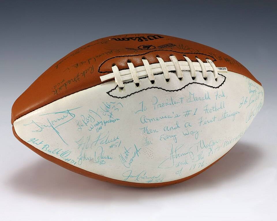 A signed University of Pittsburgh football and includes signatures from coach Johnny Majors, the Heisman Trophy winner from that year, Tony Dorsett, and the rest of the 1976 team. The football also includes an inscription to Ford which is featured on the white panel of the football.