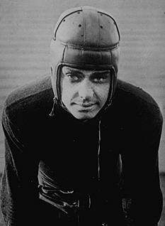 Vintage b/w publicity photo of Jim Crowley in 1923 in full Notre Dame football uniform.