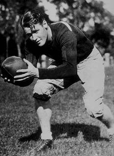 Dartmouth's Bill Morton in a ball hand off pose.