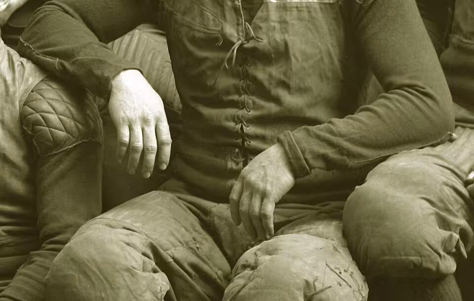 Willie Heston in a cropped view of the 1903 Michigan team photo, black and white.