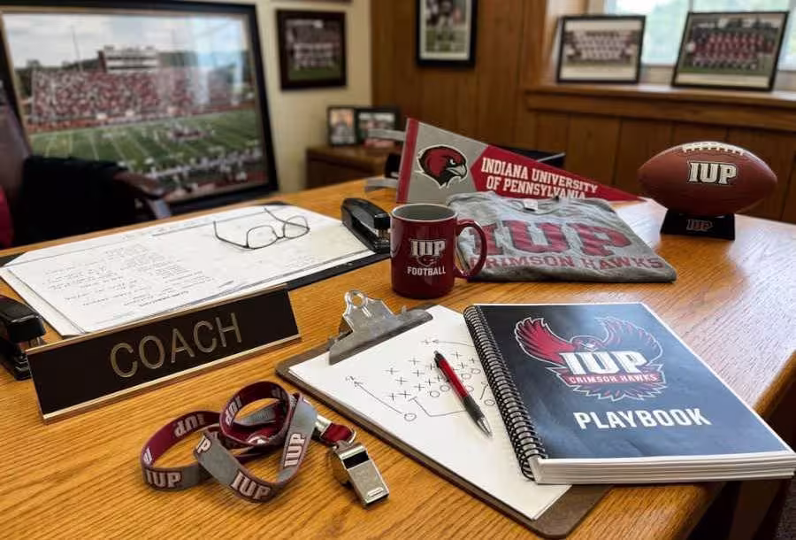Gemini AI-created image of what the Coaches' desk may have looked like.