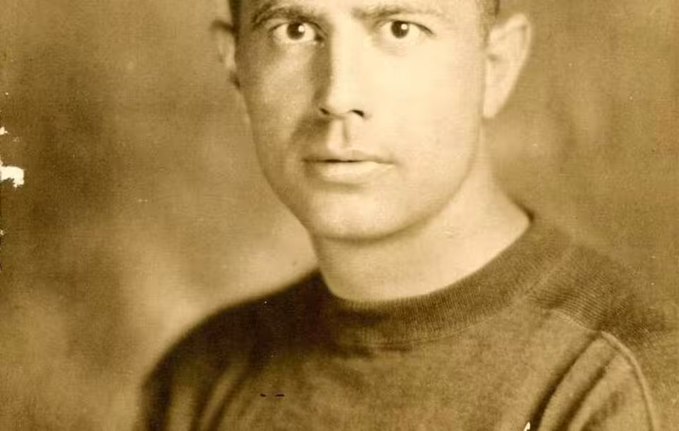 Vintage b/w A football card portrait of Verne Lewellen from the 1932 Walker's Cleaners Green Bay Packers set.